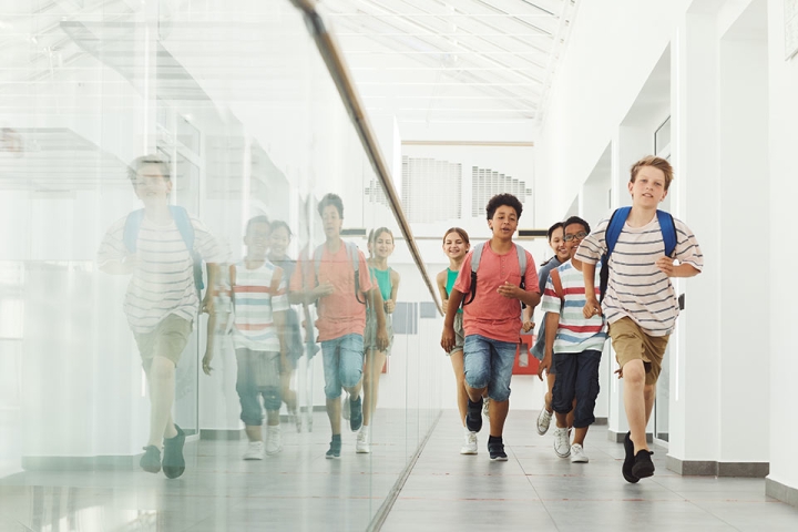 Faith in Public School A group of kids walking through the halls of a school